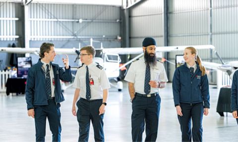 Four students talking