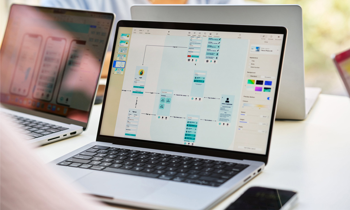 A closeup of a loaned Macbook at the Apple Foundation Program.