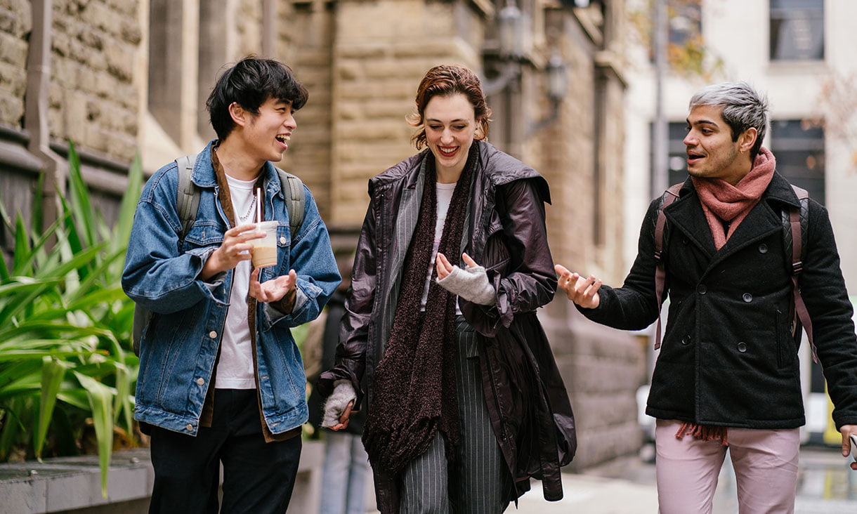 Group of students walking down Bowen St