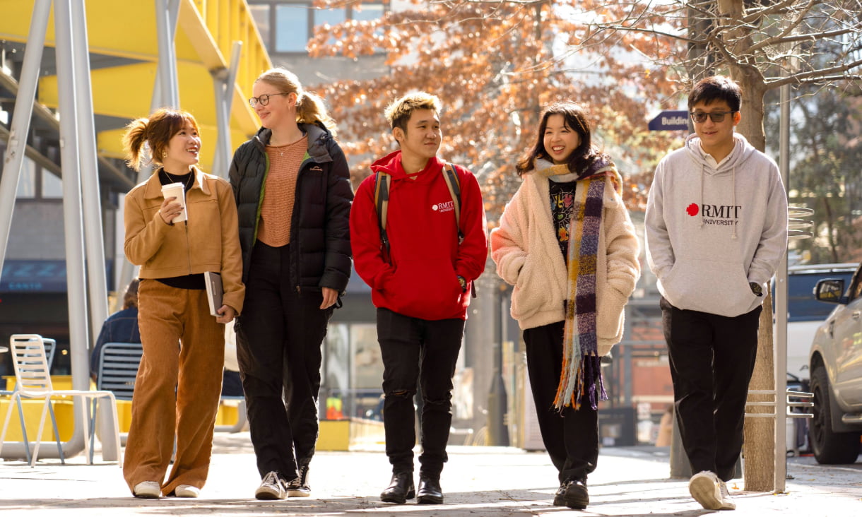Group of students walking down Bowen St