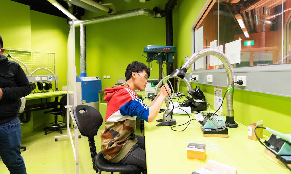 A Mechanical Engineering student works on a project.
